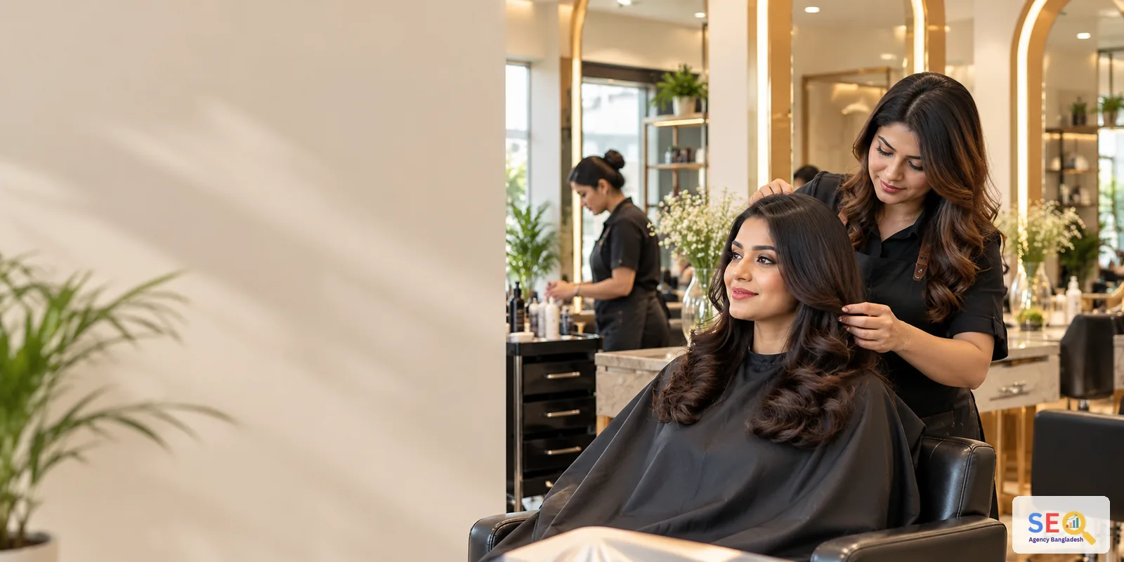 Bangladesh beauty salon stylist finishing a client's hair in a modern salon