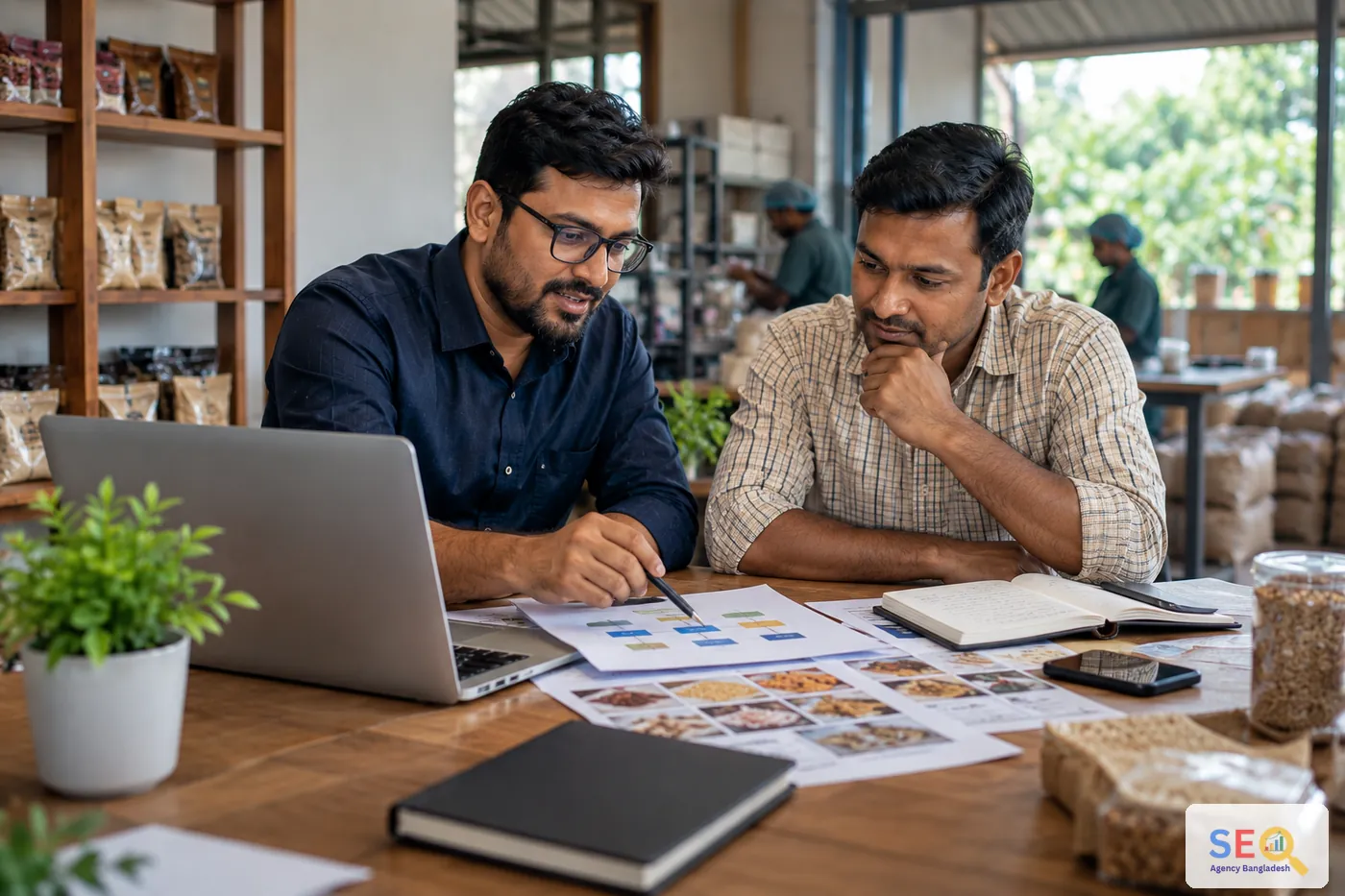 SEO consultant and Kushtia business owner reviewing research, product information and site structure