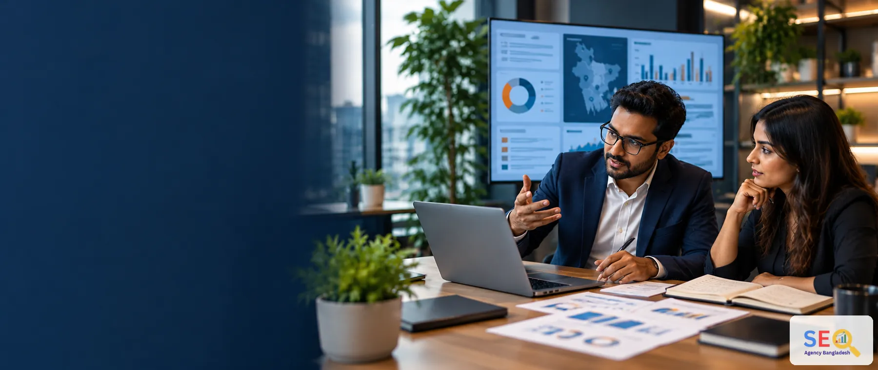 SEO consultant advising a Bangladesh business owner during a focused strategy meeting