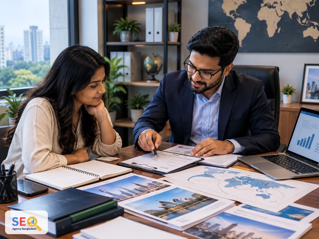 Immigration consultancy planning table with destination documents, maps, notes and a laptop